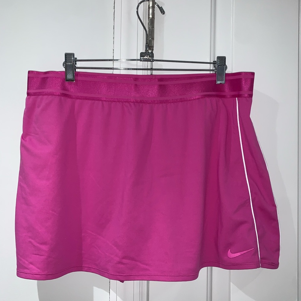 Bright pink Nike tennis skirt with built in shorts